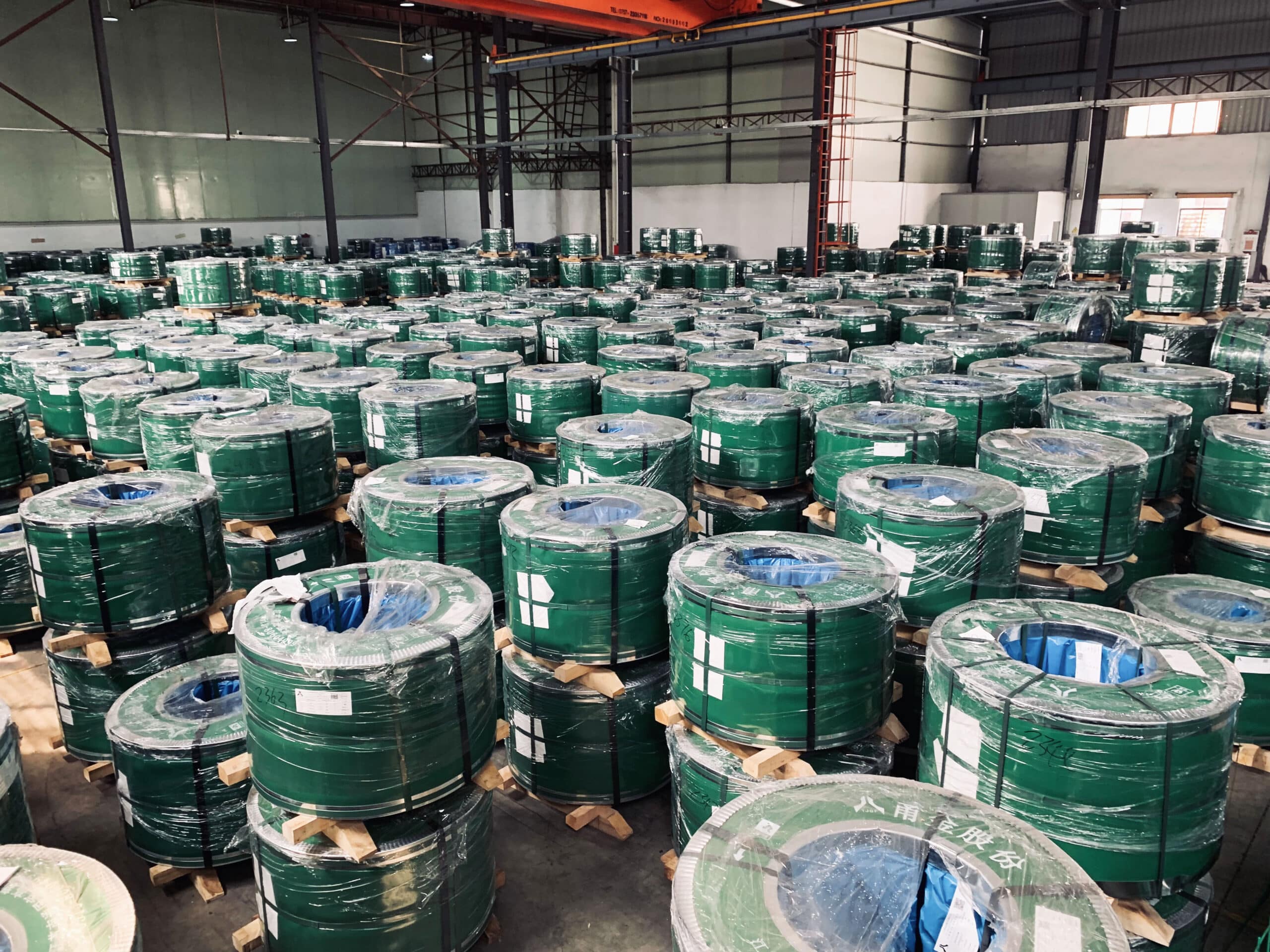 YONGJIN warehouse with 4000 to 7000 MT monthly ready stock of SUS301-CSP and SUS304-CSP stainless steel coils organized by grade and specification
